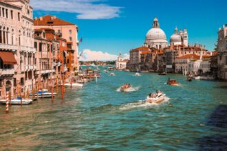 An image of houses and boats in italy
