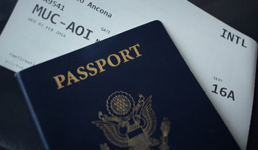 An image of a passport and a boarding pass